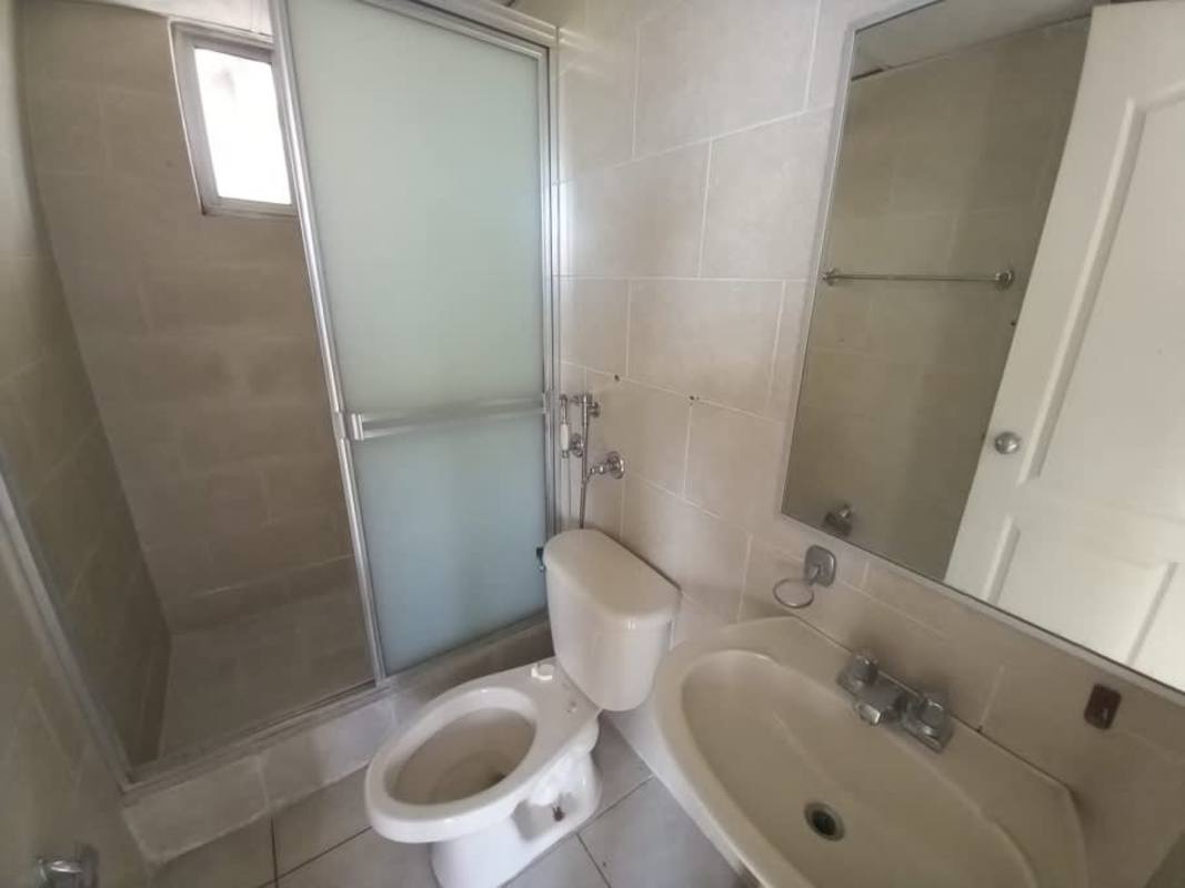 Bright living room tiled floor large window in PH Mallorca Park Gardens II San Miguelito