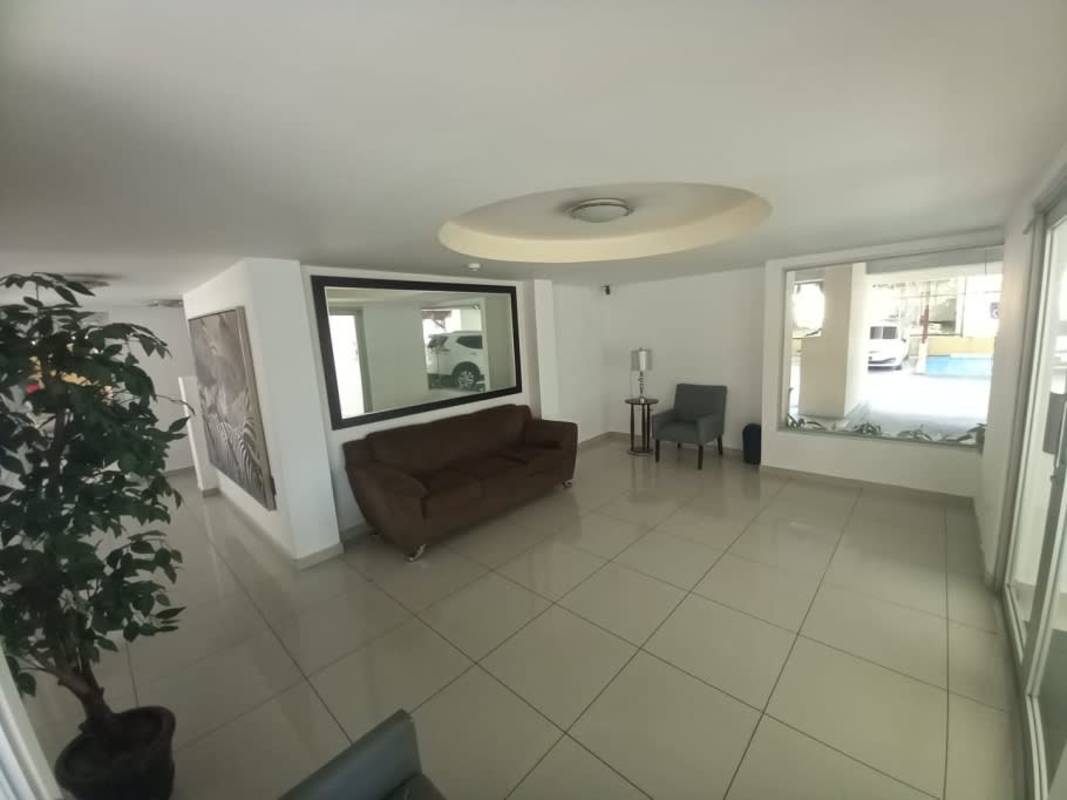 Bright kitchen with cabinets and small window PH Mallorca Park Gardens II San Miguelito