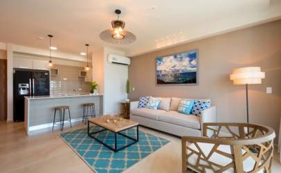 Contemporary living room with large windows at Royal Palm Gorgona Panama