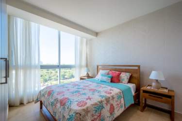 Private balcony with panoramic Pacific Ocean views glass railing at Royal Palm beach condo Panama