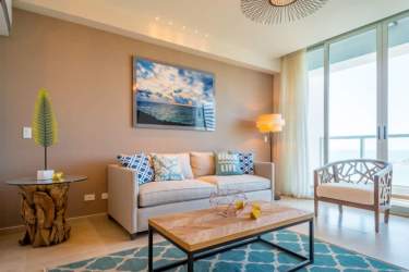 Contemporary coastal decor living room overlooking ocean balcony Royal Palm Panama
