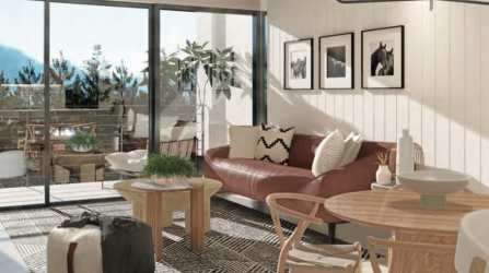 Spacious living room with large glass doors, natural light, mountain and nature views in Boquete condo