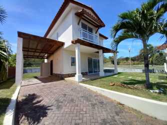 Bedroom with tile floor, corner windows and garden view in San Carlos Panama