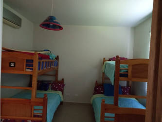Bedroom with bunk beds and AC at PH Bijao Beach Club Panama