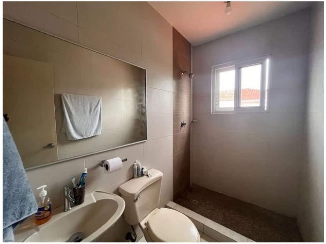 Spacious master bedroom with window and access to balcony, AC installed, ceramic floors at PH Quintas de Versalles Panama