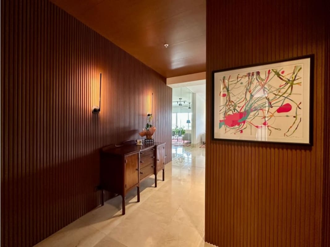 Luxury master bedroom with large windows and view over Santa Maria Golf Panama