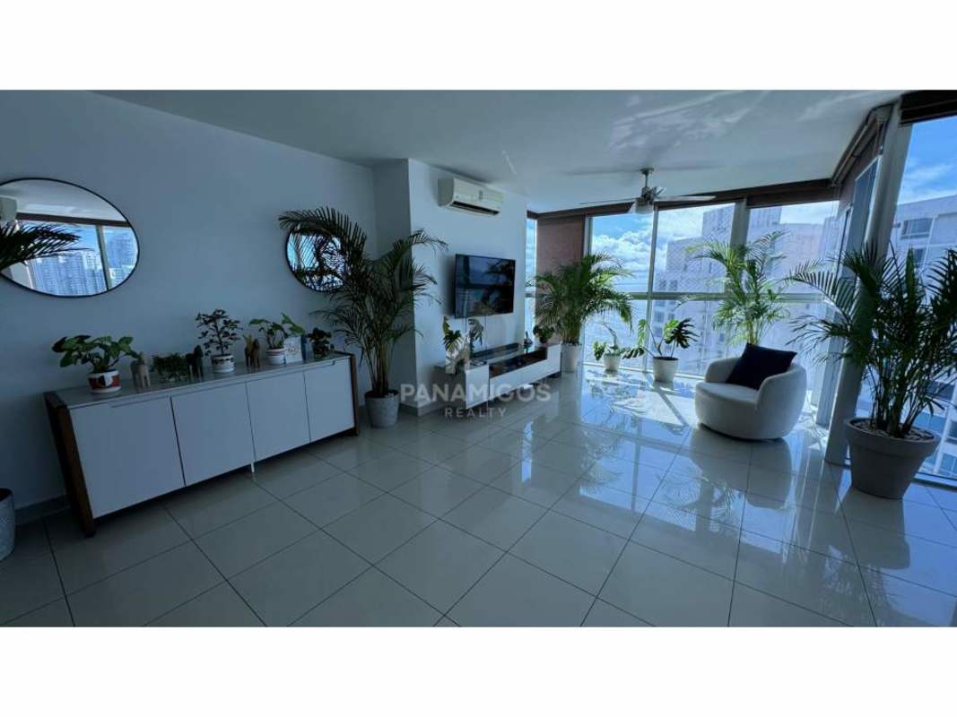 Contemporary living room floor to ceiling windows natural light Coco del Mar Panama