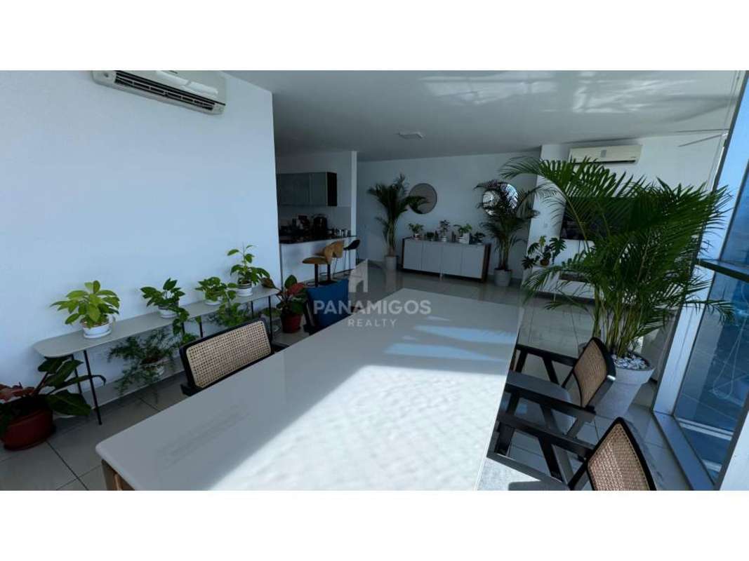 Open layout dining and living area natural light city view PH Waterfalls Panama
