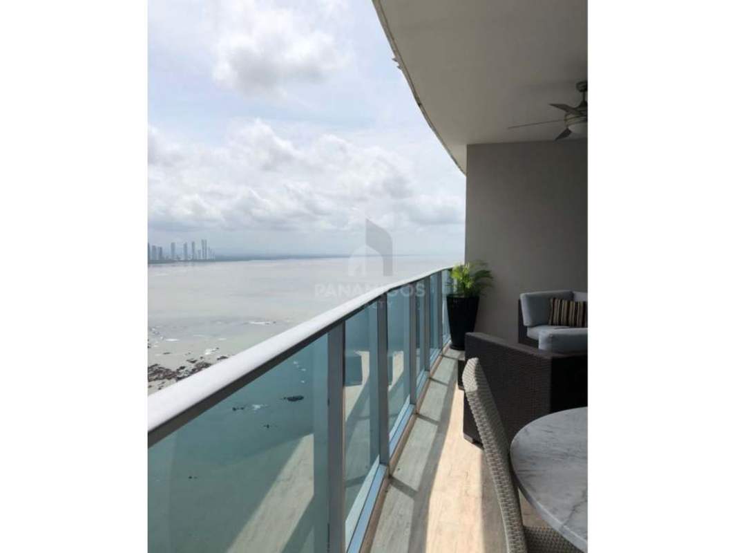 Bright master bedroom in PH Grand Tower Punta Pacifica, with large windows, neutral decor, city view