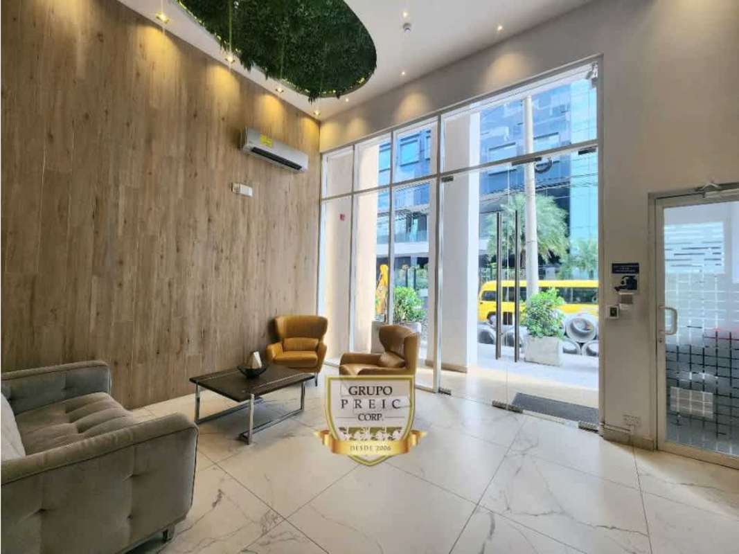 Building lobby with seating area, greenery, glass windows PH GV 43 Bella Vista Panama