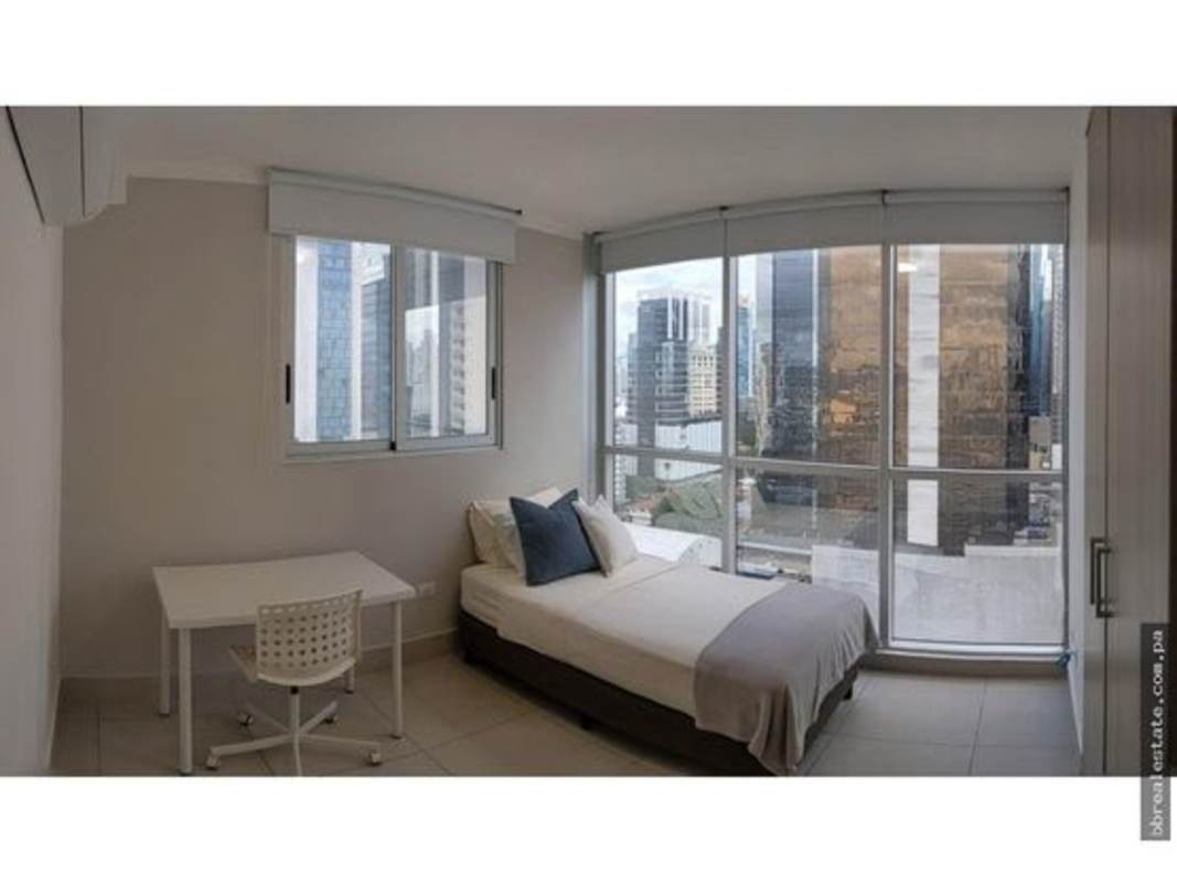Minimalist bathroom with shower enclosure, marble sink and beige tiles at PH Park City Obarrio