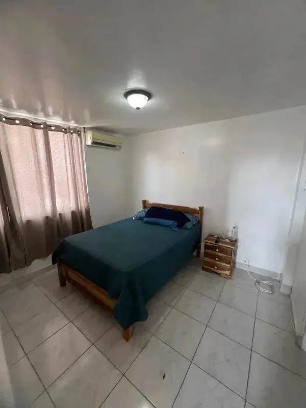 Small guest bathroom with sink, toilet, and tiled floor in PH Brisas de San Fernando