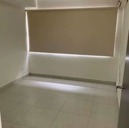 Outdoor swimming pool surrounded by green areas in PH Woodlands Panama Pacifico