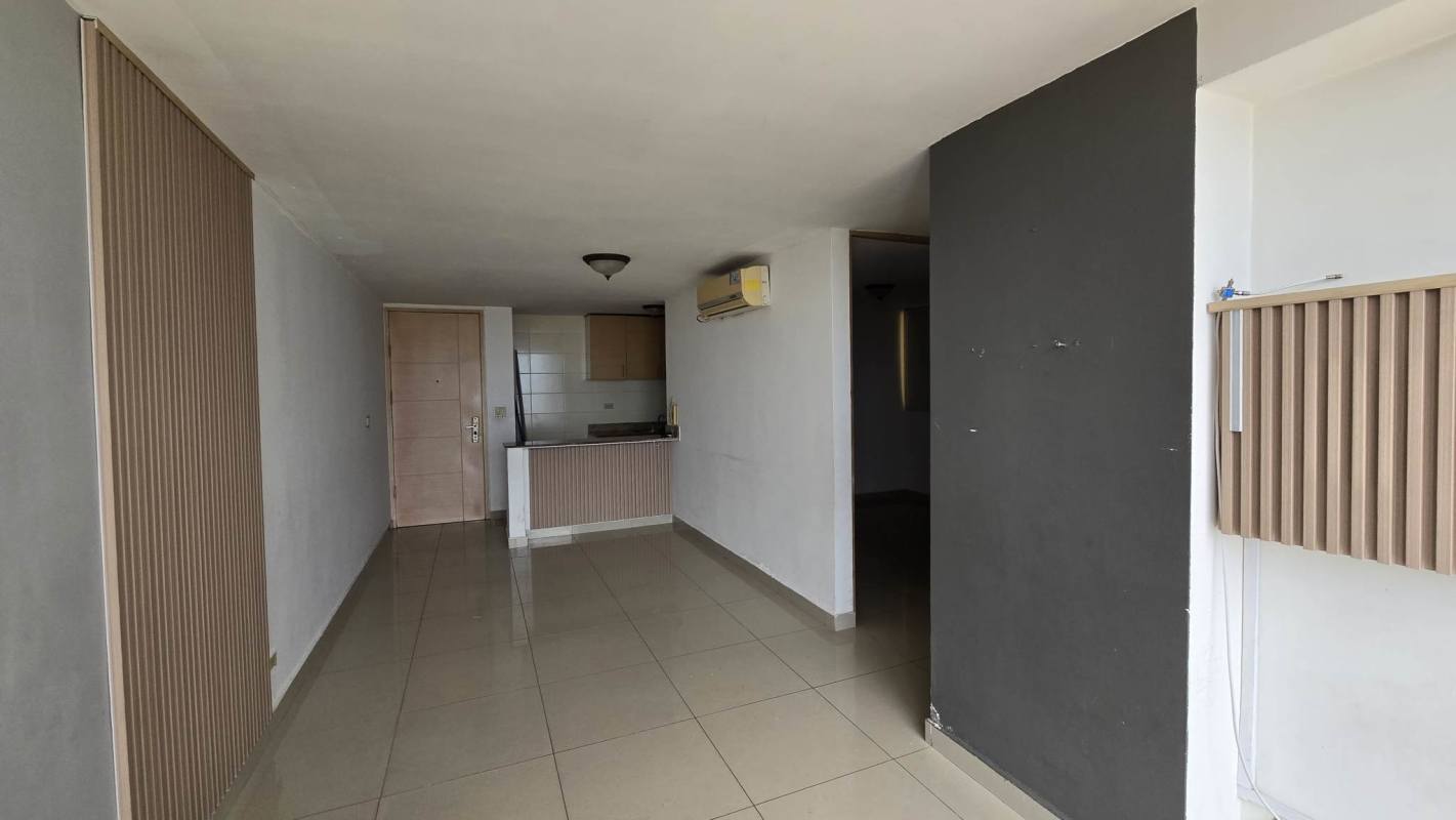 Modern compact kitchen with granite countertops, stove, tile backsplash in PH 4 Islas Panama City