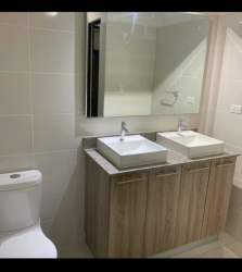 Second bedroom with air conditioning, closet space and window in PH Midtown Panama Pacifico