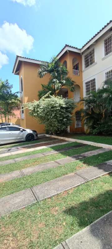 Gated entrance, landscaped exterior of Las Acacias residential Panama City