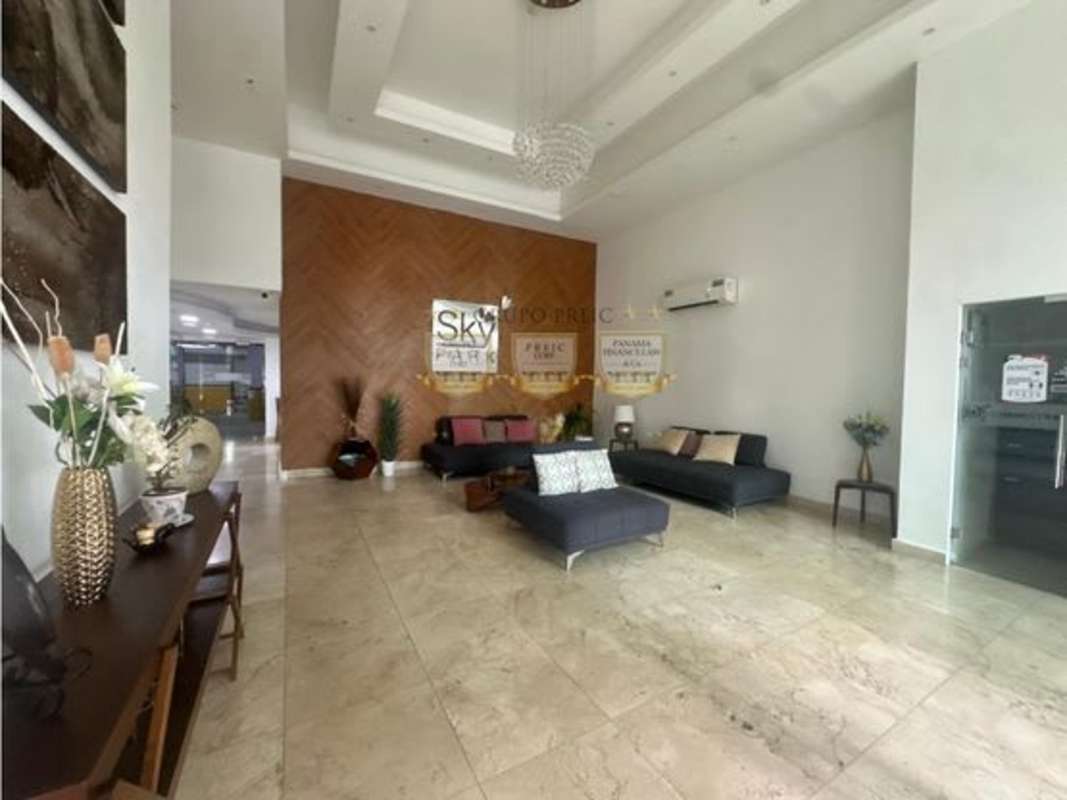 Double height entrance lobby with lounge furniture and decorated interior PH Sky Park