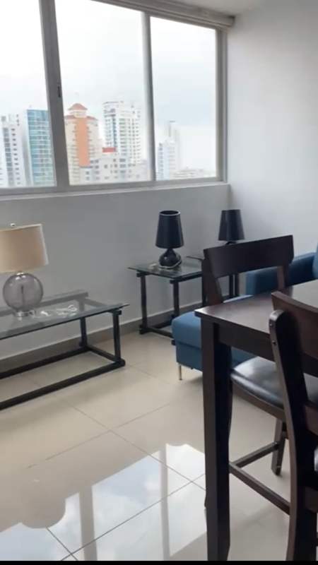 Spacious living dining room with big window and city view PH Red Point San Francisco Panama