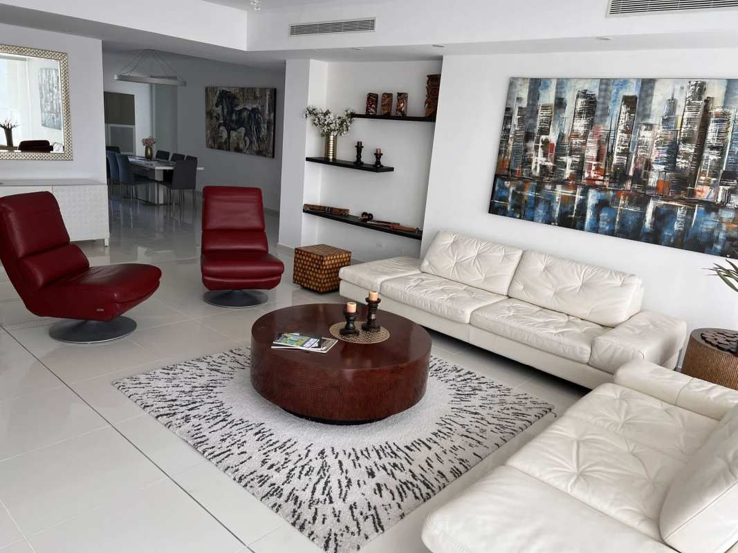 Spacious kitchen with granite counters, breakfast island, stainless appliances oceanfront Panama apartment