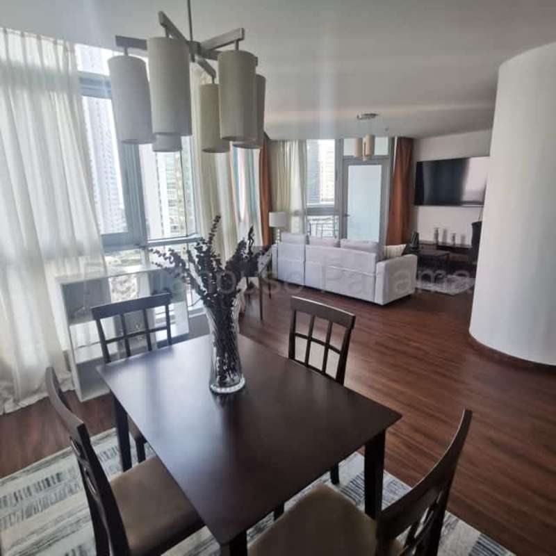 Bright dining area connected to living room with large windows and balcony ocean view PH Riverside Costa del Este Panama