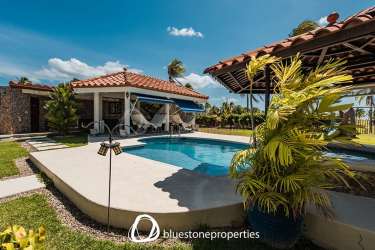 Spacious open living dining area with vaulted ceiling, contemporary decor in Vista Mar beach house Panama