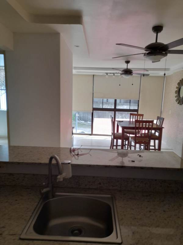 Swimming pool outdoor amenity with deck and covered area in PH Altos de la Colina 12 de Octubre Panama