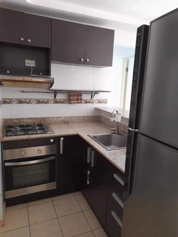 Empty bedroom with tile floor, ceiling fan and windows in PH Altos de la Colina 12 de Octubre Panama