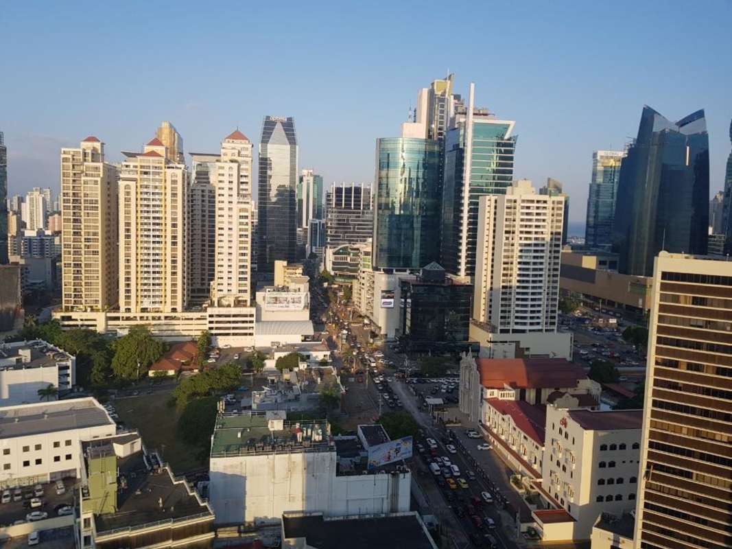 Contemporary bathroom with beige wall tiles, square sink, designer fixtures in PH Denovo Obarrio Panama