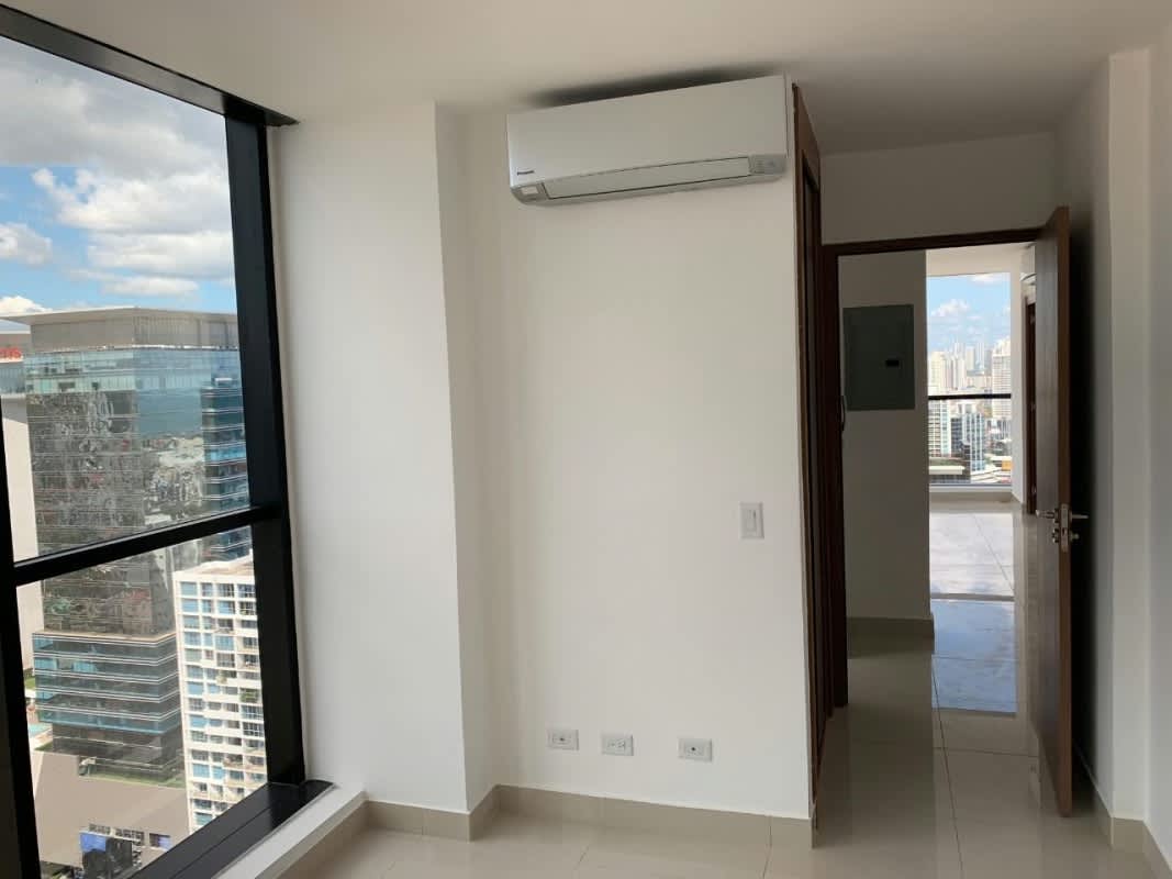 Unfurnished bedroom with panoramic city views in PH Downtown Panama apartment