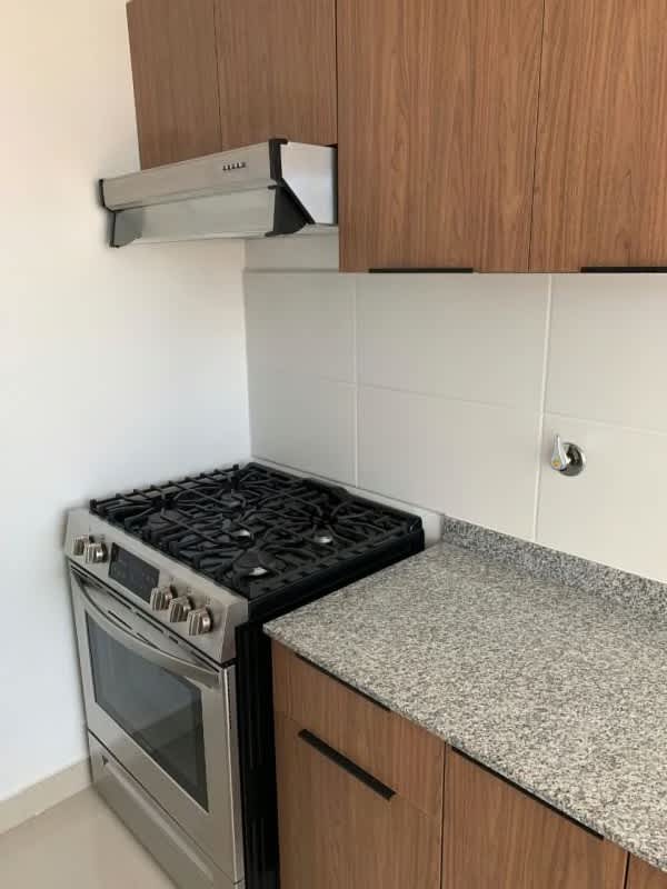 Bright living space with city skyline views from glass windows PH Downtown Panama Obarrio