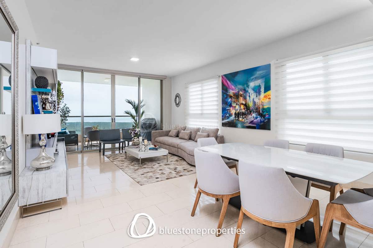 Bright bedroom with large window, city and golf views at Santa Maria Golf Condo Panama