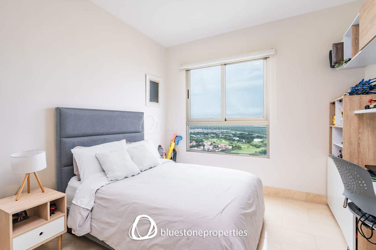 Open living space with access to kitchen and dining area at luxury condo in Santa Maria Panama