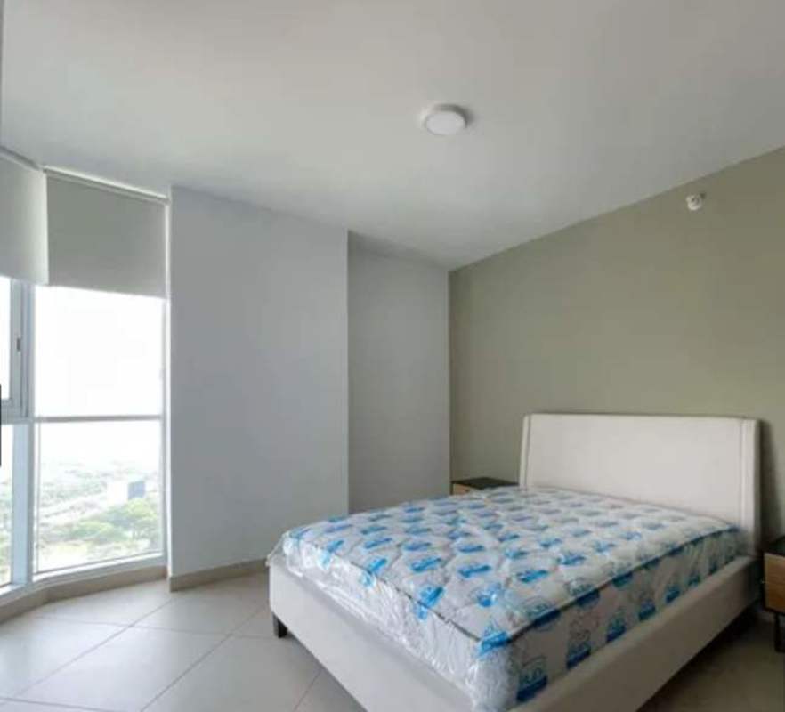 Spacious bedroom with furniture and city views PH Costa del Este apartment for rent