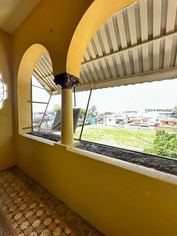 Balcony with arches and Mediterranean details overlooking Santa Ana neighborhood Panama