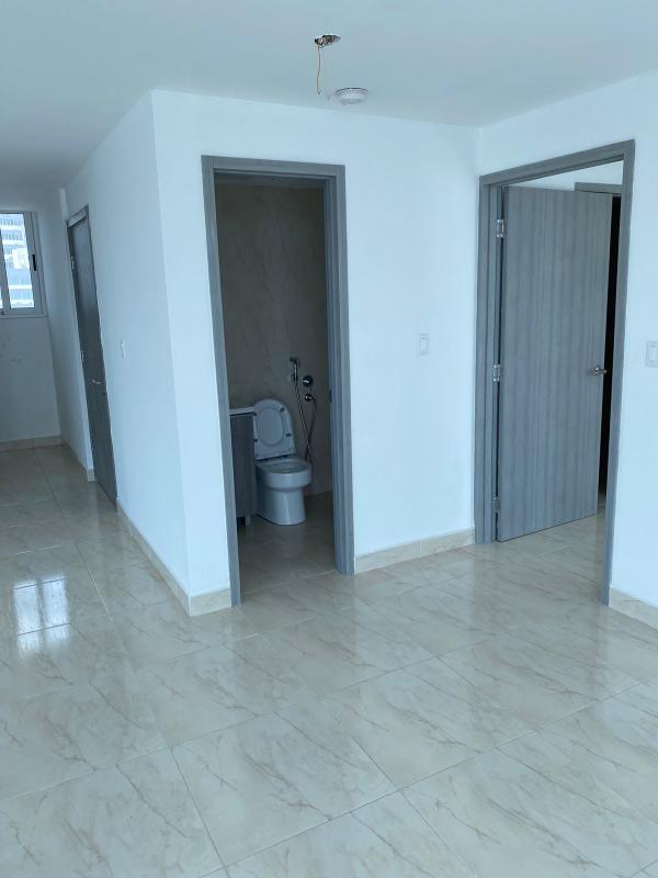 Sleek kitchen with granite counters and cabinets at PH The Sands Panama City