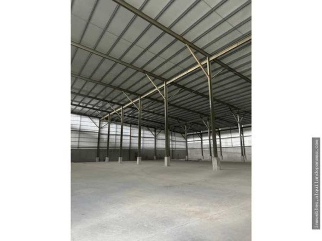 Spacious empty industrial warehouse interior with high clearance and steel beams Panama City