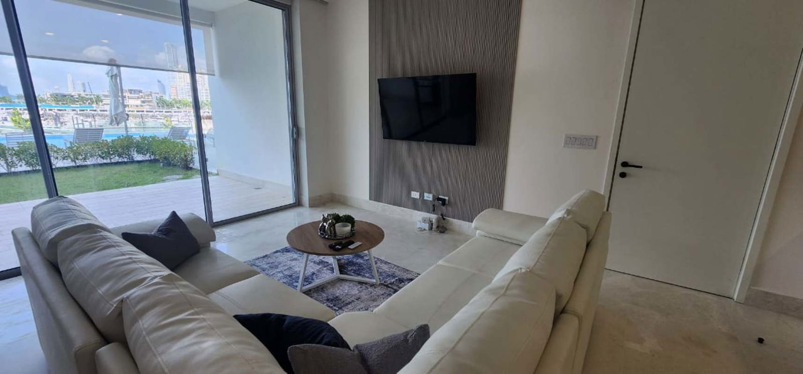 Furnished living and dining with floor-to-ceiling windows Ocean Reef Beach Club Panama