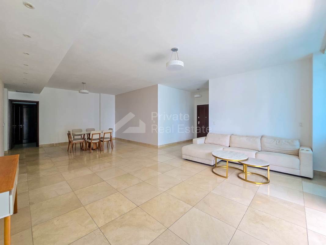 Spacious kitchen with central island, modern appliances and large window PH Aventura Tower Panama City