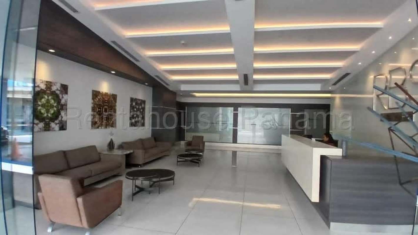 Elegant marble lobby with reception desk at RBS Tower Panama