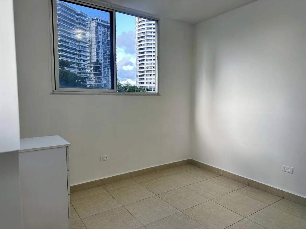 Laundry area with granite counter, utility sink, water heater at PH Bella Vista Gardens Panama