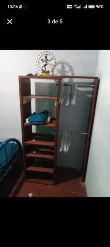 Minimalist small bedroom with closet, hanging space, natural light for rent Carrasquilla Panama