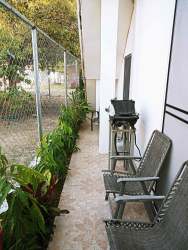 Bathroom with walk-in shower, ceramic tiles near Playa Serena Panama