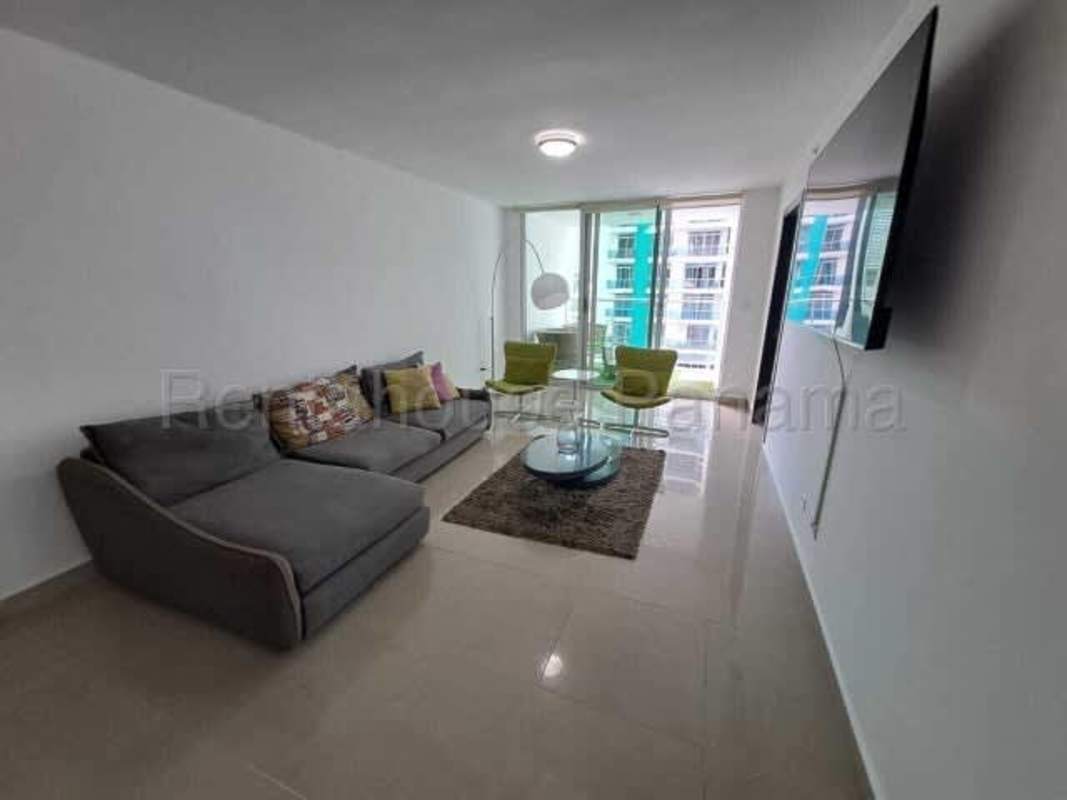 Spacious living room with sectional sofa and large windows in PH Bella Vista Center Panama City