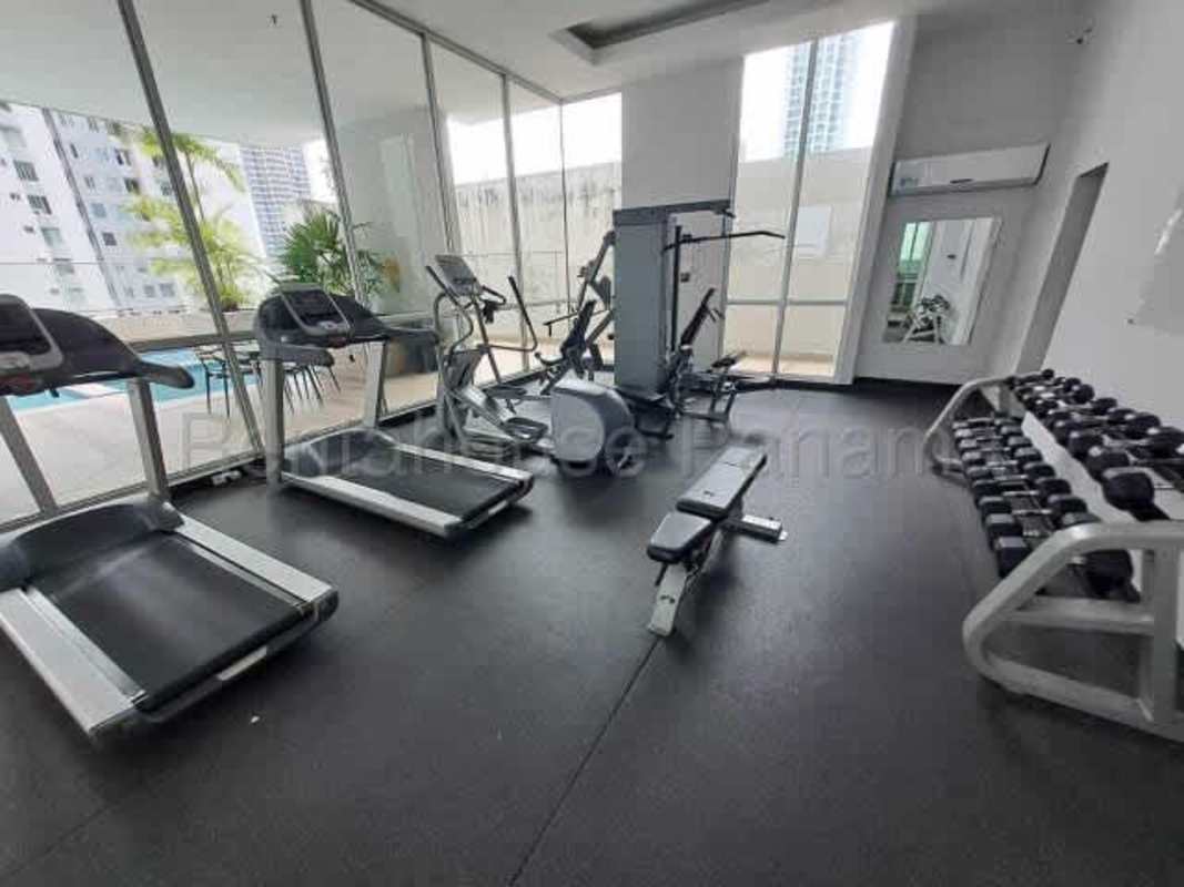 Fitness center overlooking city, modern equipment at PH Bella Vista Center Panama