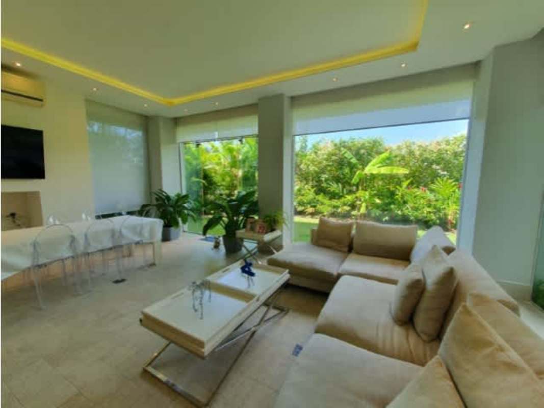 Modern kitchen with island, stainless steel appliances in luxury apartment Santa María Panama