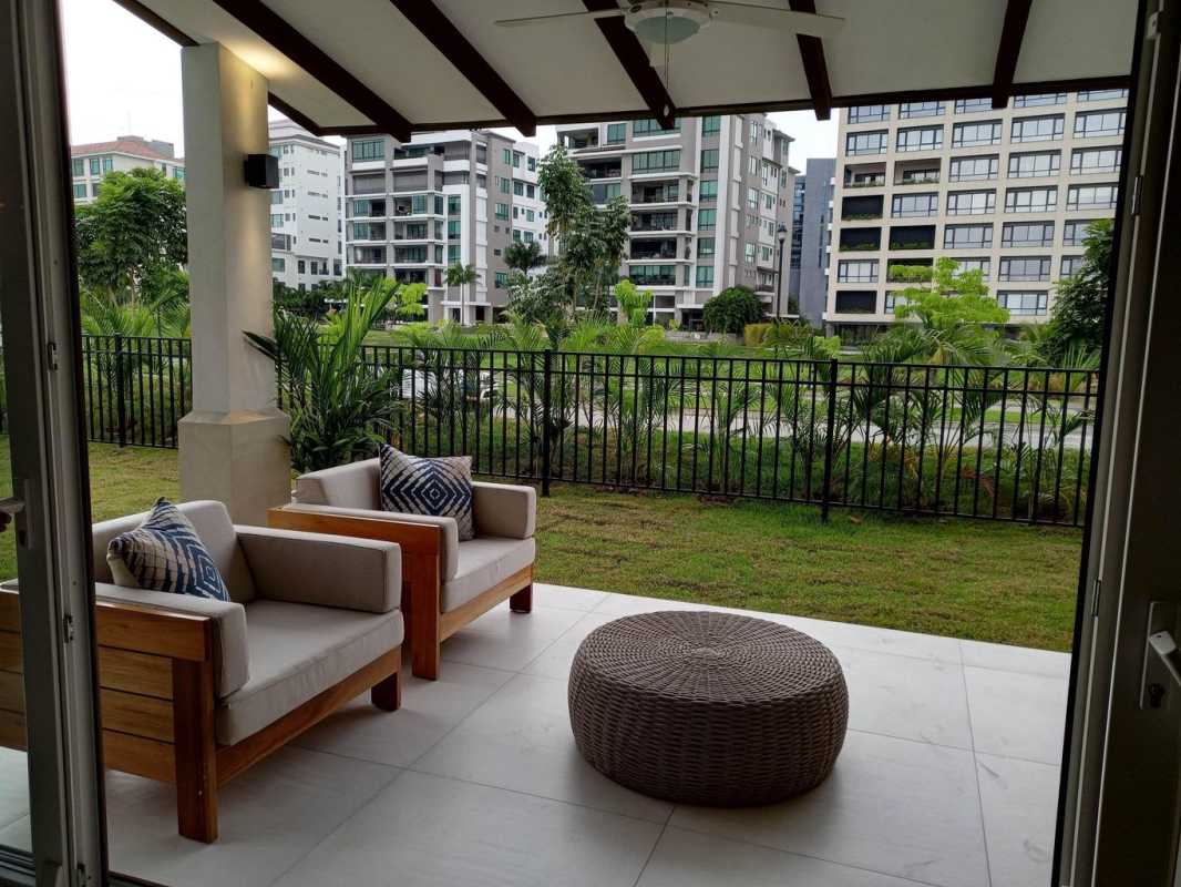 Spacious bedroom with large window neutral decor upscale residence The Woods Panama