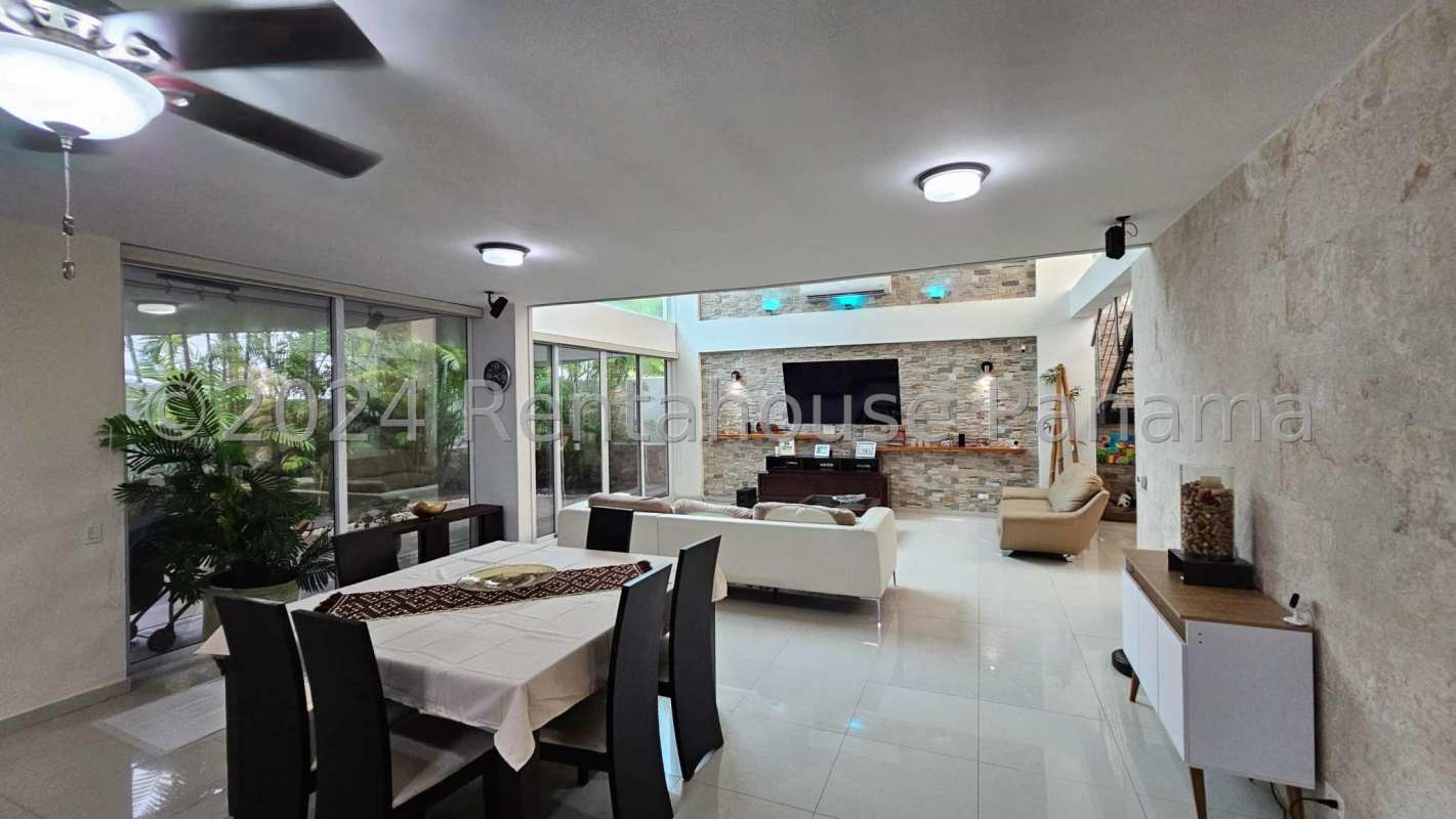 Bright bedroom with closet AC and fan in Costa Sur Panama house