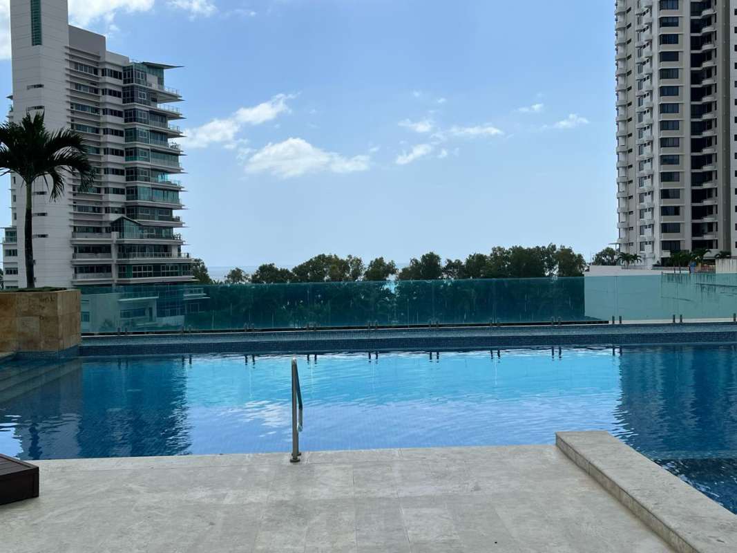 Outdoor terrace lounge with city and ocean views PH Quartz Panama