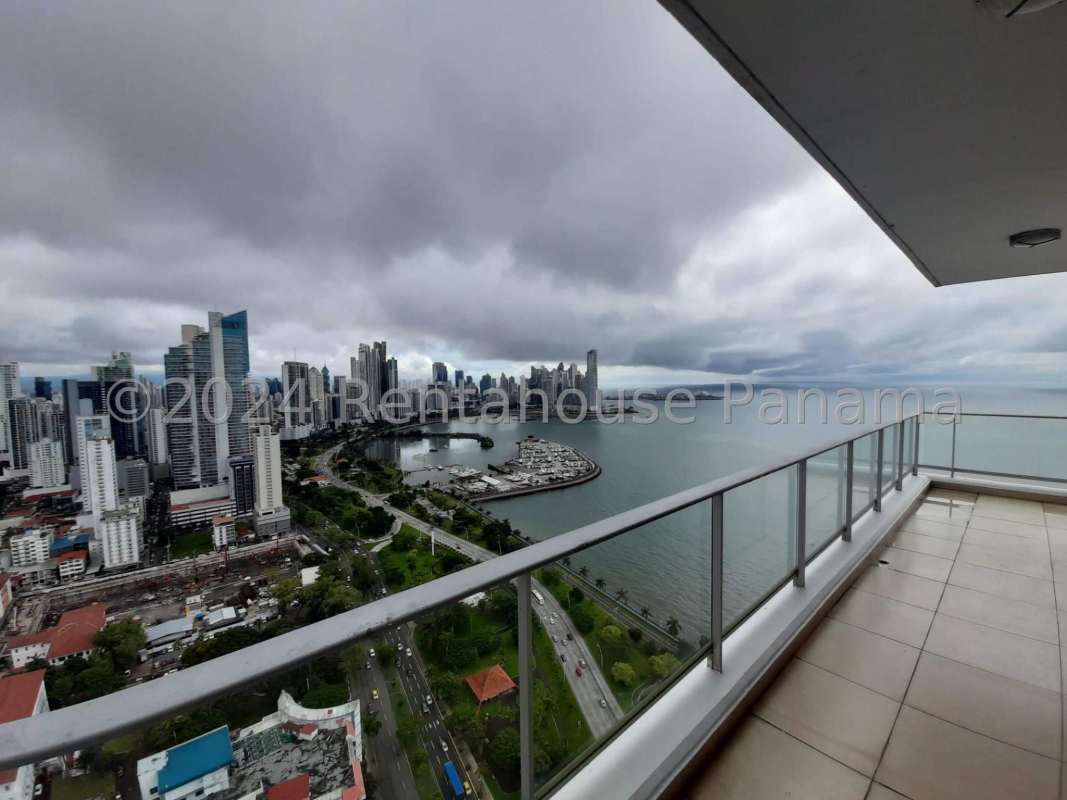 Contemporary kitchen with stainless steel appliances, breakfast bar, city view Destiny Tower Panama