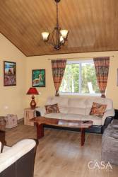 Rustic wood-ceiling bedroom in farmhouse on riverfront land Gualaca Panama